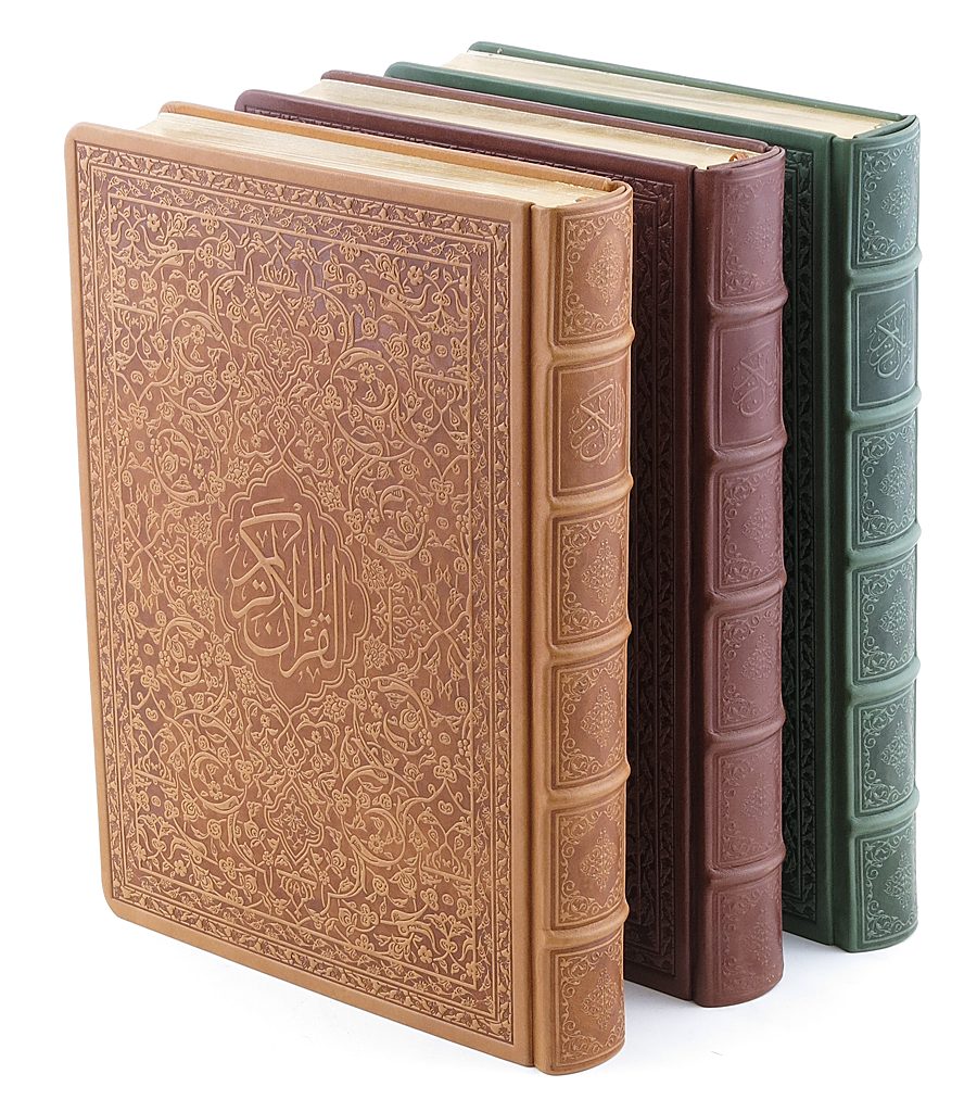 Three genuine-leather Qur'an bindings in tan, maroon and green with hand-formed raised spine bands