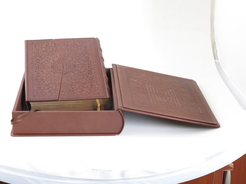 Maroon leather clamshell traycase, open